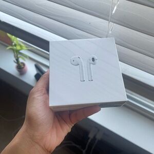 Apple AirPods (2nd Generation) with Charging Case